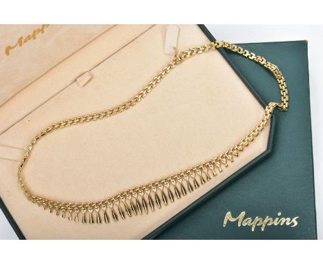 A YELLOW METAL ARTICULATED FRINGE NECKLACE, graduated lozenge shape fringe, to a gate style chain and an integrated box clasp