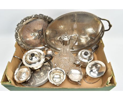 A BOX OF ASSORTED WHITE METAL WARE, to include a large oval tray with a pierced rim and double handles, a circular tray with 