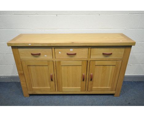 A 'GLOBAL HOME' LIGHT OAK SIDEBOARD, with three drawers, width 170cm x depth 45cm x height 100cm