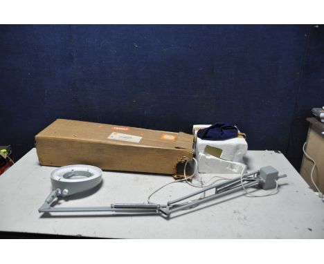A ONE THOUSAND AND ONE LAMP LTD INDUSTRIAL ARTICULATED INSPECTION LAMP with central magnifying glass surrounded by a floresce