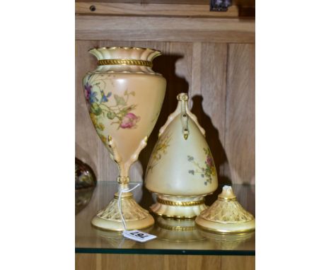 A NEAR PAIR OF ROYAL WORCESTER BLUSH IVORY PEDESTAL VASES, florally decorated, shaped as a claw holding an amphora No2314, Rd