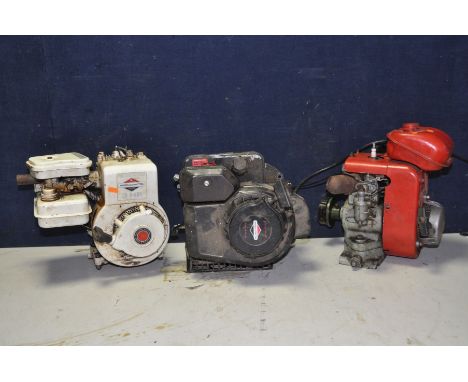 THREE LAWNMOWER ENGINES comprising of two Briggs and Stratton engines a 3HP 127cc and another 148cc together with another unb