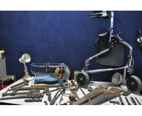 A BOX CONTAINING HAND TOOLS to include saws, chisels, clamps, a mitre saw, wood dye, hand drill and a Days rollator