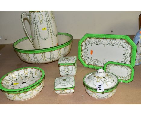 A ROYAL DOULTON EIGHT PIECE WASH AND DRESSING TABLE SET, pattern number D3070,  comprising wash jug and bowl (both pieces cra