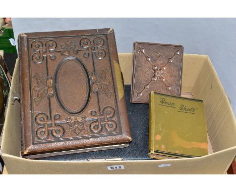 A BOX OF EDWARDIAN AND LATE VICTORIAN PHOTOGRAPHS, over two hundred photographs contained in three albums and a frame, the sm
