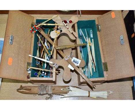 TWO WOODEN BOXES OF LACE MAKING BOBBINS, including bone, wooden, plastic, printed and painted examples, many having beads att
