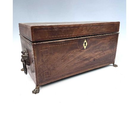 A George III mahogany, inlaid and crossbanded rectangular tea caddy, with shell inlaid lid, internally with glass bowl and tw