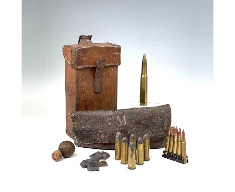 A leather ammunition pouch, 19th century, slightly rounded, initialled M, length 24cm, together with a leather ammunition box