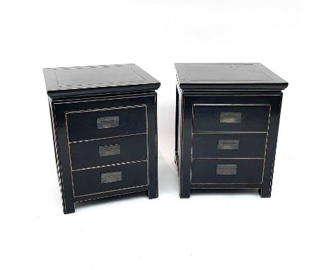 A pair of OKA black lacquered bedside chests, in the Oriental manner, each fitted three drawers with flush brass handles on b