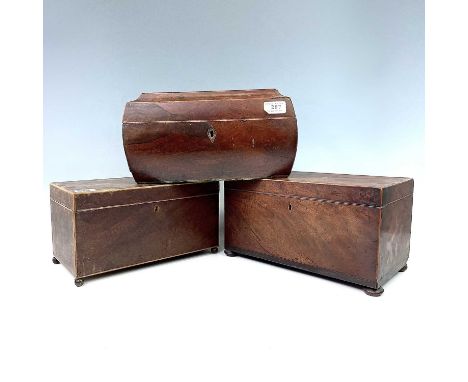 An early Victorian rosewood bombe tea caddy, with two lidded compartments and a glass bowl, width 30.5cm, together with two G