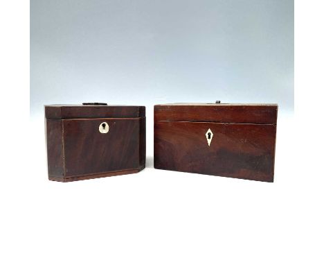 A George III mahogany and boxwood strung rectangular tea caddy, the single lidded container with figured oval cover and recep