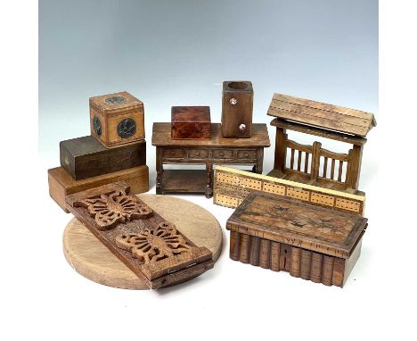 An unusual 1920s oak trinket box modelled as a low dresser, with hinged lid, width 24cm, together with a pipe rack, a chess s