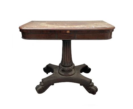 A William IV rosewood card table, with fold-over top on a lotus capped fluted pillar and quadruped base with volute scroll fe