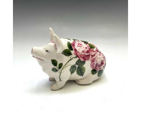 A Wemyss Exon painted figure of a pig, decorated with cabbage roses, impressed and painted marks, numbered 2495 and signed B 