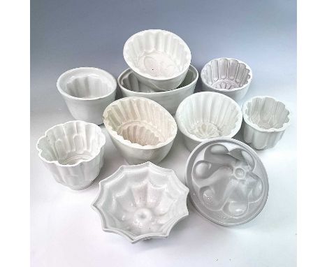 Two Shelley porcelain jelly moulds together with eight other porcelain and ceramic jelly moulds, (10)