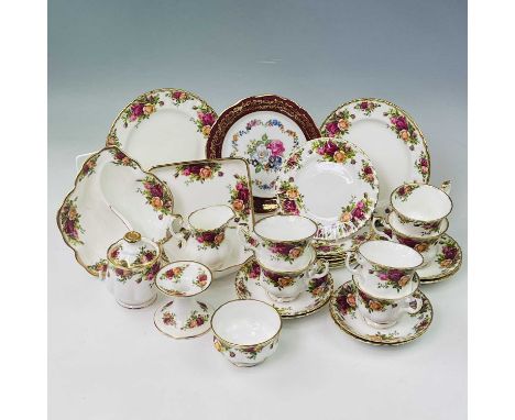 A Royal Albert Old Country Roses part tea service comprising six teacups and saucers, six side plates, two sandwich plates, m