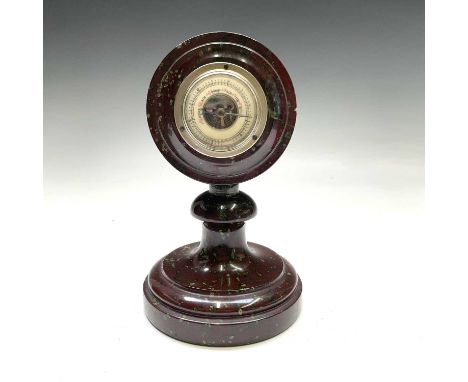 A Cornish serpentine aneroid pedestal barometer, with annular mount and turned base, height 21.5cm.