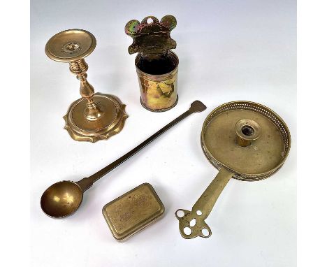 An 18th century style brass baluster candlestick, on a shaped base, height 18cm, together with a brass chamberstick, a ladle,