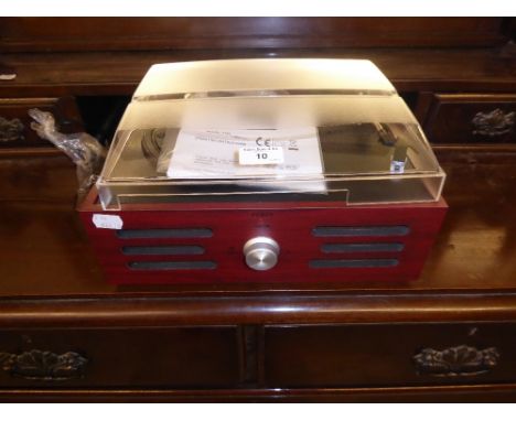 A SMALL MODERN TABLE-TOP RECORD PLAYER 