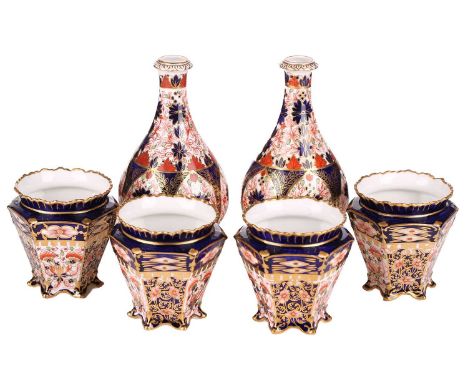 A set of four Royal Crown Derby "Old Imari" pattern small tapering cachepot of octagonal form, bearing the date marks for 192