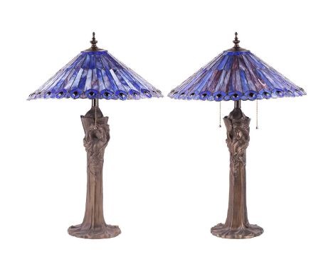 A pair of Art Nouveau style figural-column lamp bases, late 20th century, together with an associated pair of Tiffany-style b