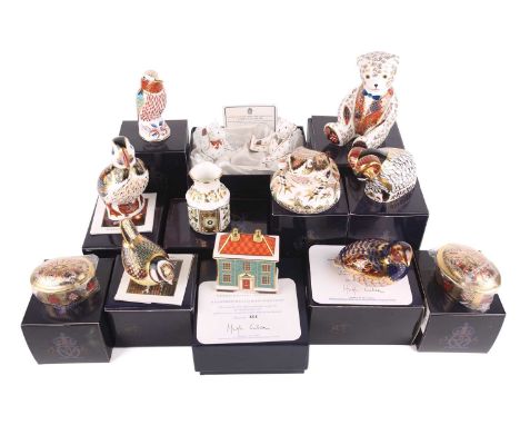 A collection of boxed Royal Crown Derby Mostly Imari, bone china paperweights and small vases and boxes, including, a signed 