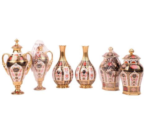 A collection of six boxed Royal Crown Derby "Old Imari" items including, two Golden Orchid Vases, two Tissington Vases and Co