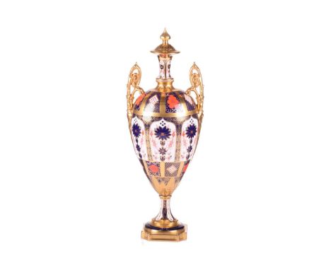 A large and impressive Royal Crown Derby "Old Imari" pattern (1128) bone china two-handled urn and cover, bearing the date ma