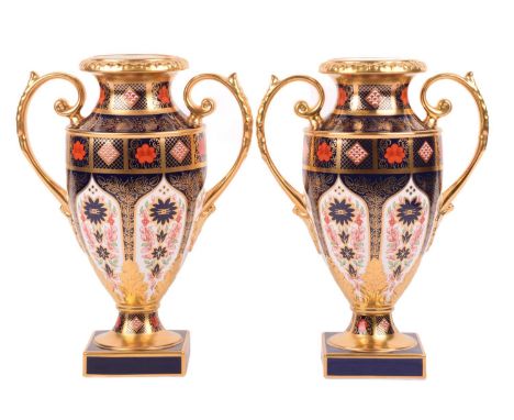 A pair of large Royal Crown Derby "Old Imari" pattern bone china two handled "Thorpe" vases, bearing differing date marks for