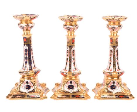 A pair of boxed Royal Crown Derby bone "Old Imari" bone china table candlesticks, bearing the date marks for 1983 and other d