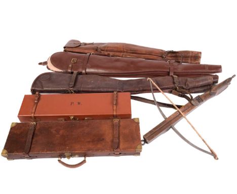 A leather shotgun case, with brass corners and leather straps, labelled for the Army and Navy Co-Operative Society, 83.5 x 23