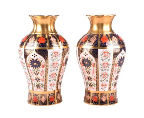 A pair of Royal Crown Derby 'Old Imari' heavy baluster vases, bearing the date marks for 2008, in original presentation boxes