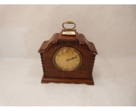 A walnut mantle clock, the French brass drum movement with platform escapement. 8' high