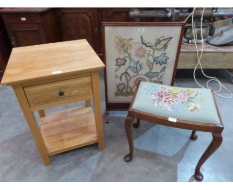 An oak bedside table, an embroidered firescreen and a tapestry seat dressing table stool