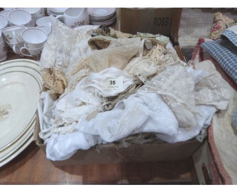 A box of lace textiles