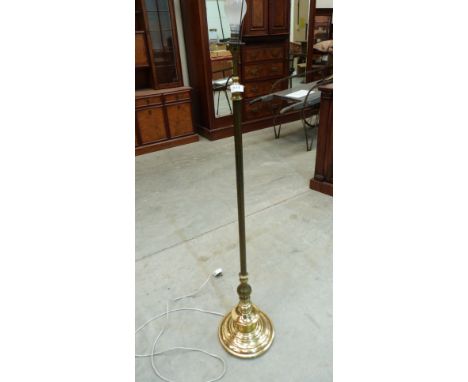 A brass lamp standard 