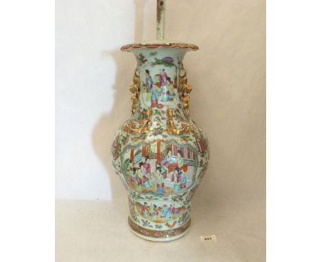 A Chinese canton famille-rose decorated vare converted as a table lamp but not drilled 17½' high