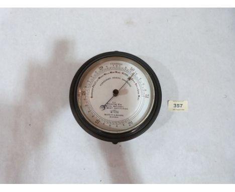 A Negretti + Zambra Fisherman's aneroid barometer. 6' diam.