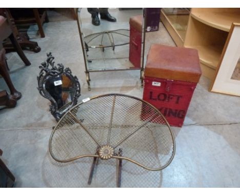 A brass mirror fireguard; a spark guard, a reproduction strut mirror and a tin box stool
