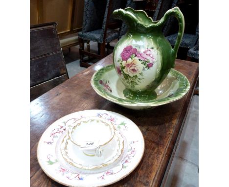 A Royal Worcester chinoiserie decorated plate, a Royal Worcester foliate gilded cup and saucer and a Staffordshire jug and bo