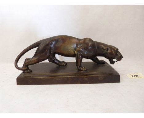 A bronzed metal model of a Jaguar. Marked to the base HB for Goldscheider. 9¼' long
