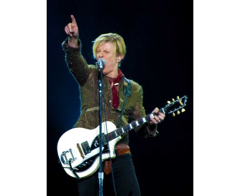 A high-quality photo print of a portrait of David Bowie, taken by photographer Philippe Auliac in 1999. Measures 30x 40cm. Wi