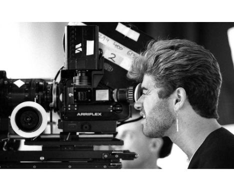 A high-quality photo print depicting George Michael, taken by photographer Martyn Goddard in 1987. The photo depicts George M