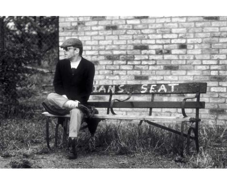 A high-quality photo print depicting Ian Dury, taken by photographer Martyn Goddard in 1980. The photo depicts Ian Dury on 'I