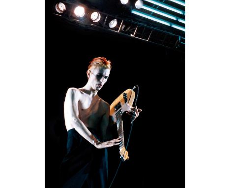 A high-quality photo print of a portrait of David Bowie, taken by photographer Philippe Auliac in 1976. Measures 30x 40cm. Wi