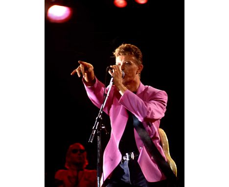 A high-quality photo print of a portrait of David Bowie, taken by photographer Philippe Auliac in 1991. Measures 30x 40cm. Wi