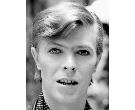 A high-quality photo print of a portrait of David Bowie, taken by photographer Philippe Auliac in 1976. Measures 30x 40cm. Wi