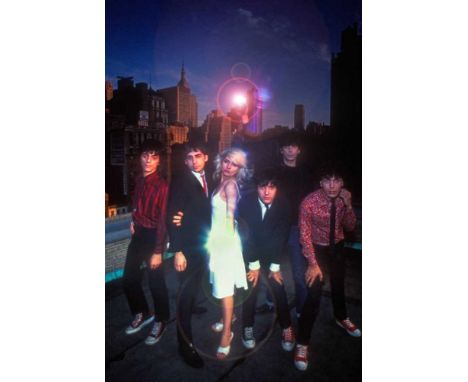 A high-quality photo print depicting Blondie taken by photographer Martyn Goddard in 1976. The photo depicts the group posing