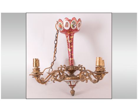 An Unusual Venetian Red Overlaid Chandelier with a central column, with a gilded decoration, with several portrait and floral