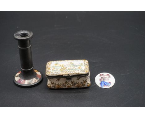 A late 18th/early 19th century French porcelain casket,&nbsp;the hinged top painted with a figure and two serpents, 7.5cm wid